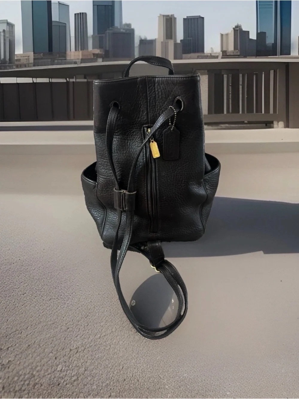 Coach Black Leather Drawstring Backpack with Gold Tag
